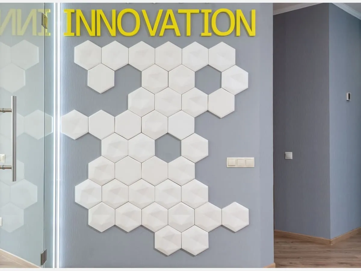 Company lettering set against a textured feature wall